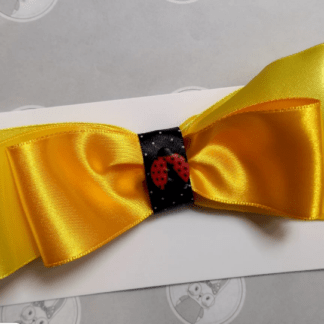 Faixa cabelo amarela seda joaninha